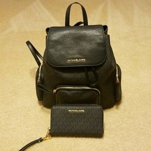Michael Kors backpack and zip around wallet